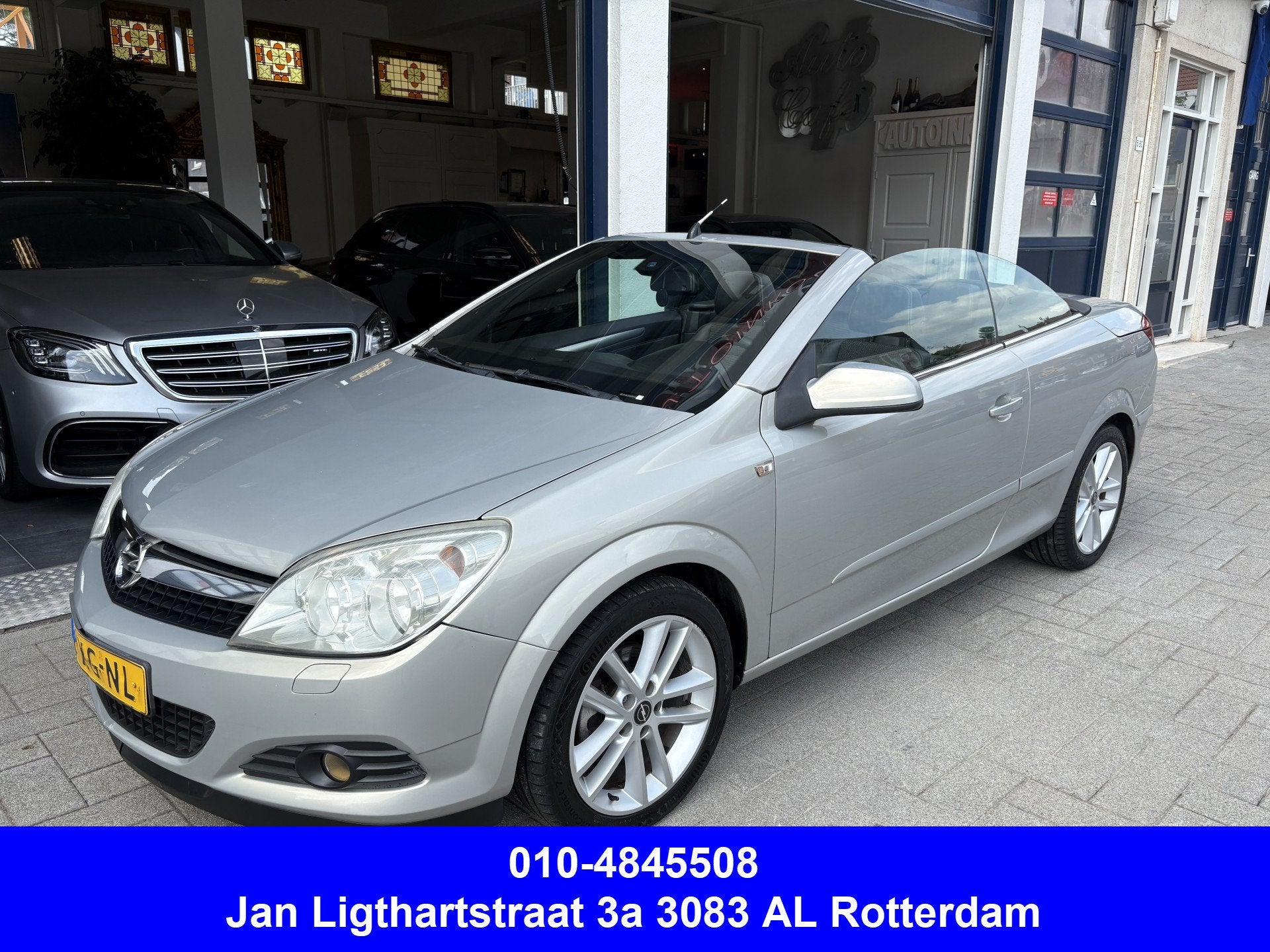 Opel Astra TwinTop 1.8 Cosmo NL AUTO AIRCO/CRUISE/LEDER, Auto's, Opel, Gebruikt, 4 cilinders, Cabriolet, 4 stoelen