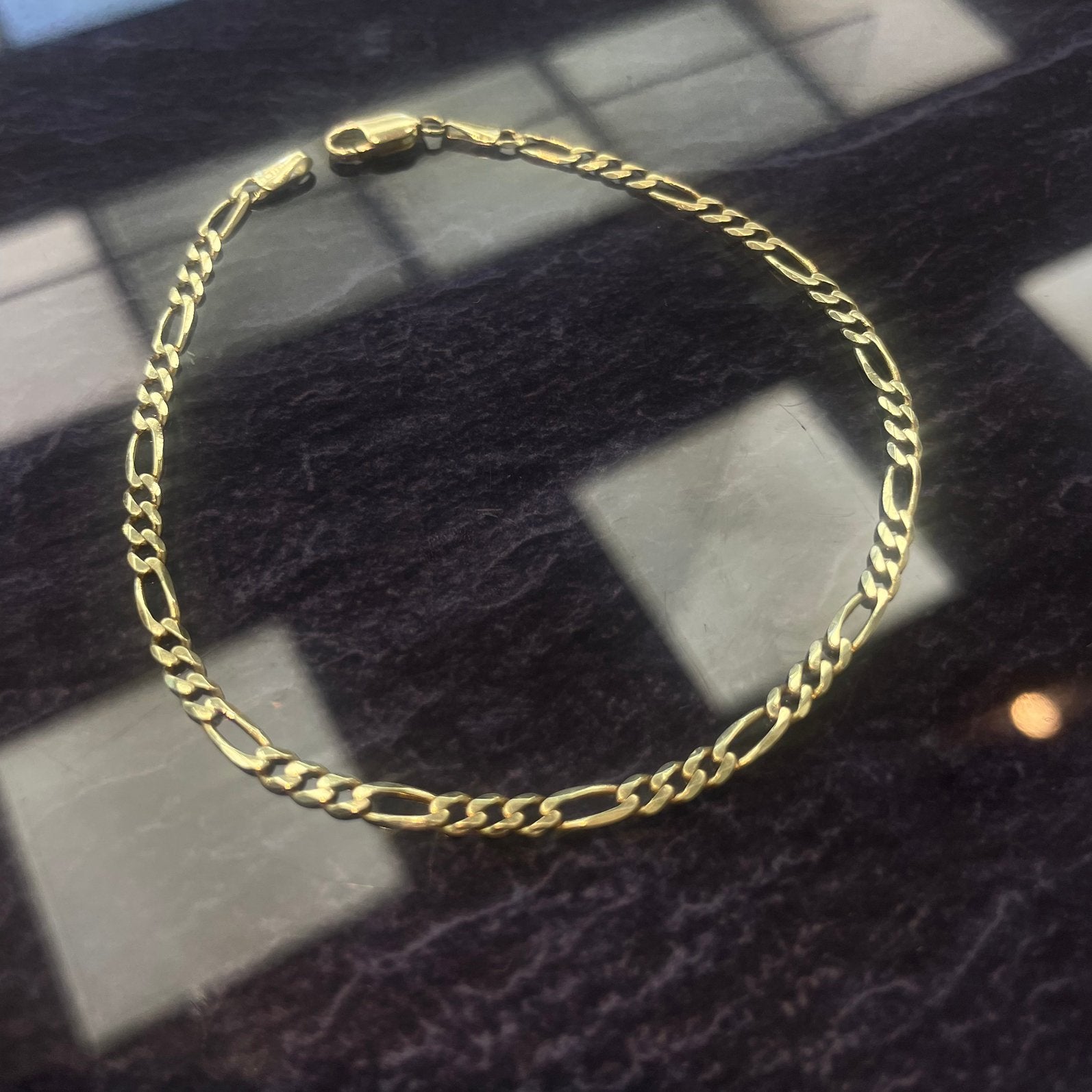 14k gouden figaro armband, Ophalen of Verzenden, Zo goed als nieuw, Goud, Goud