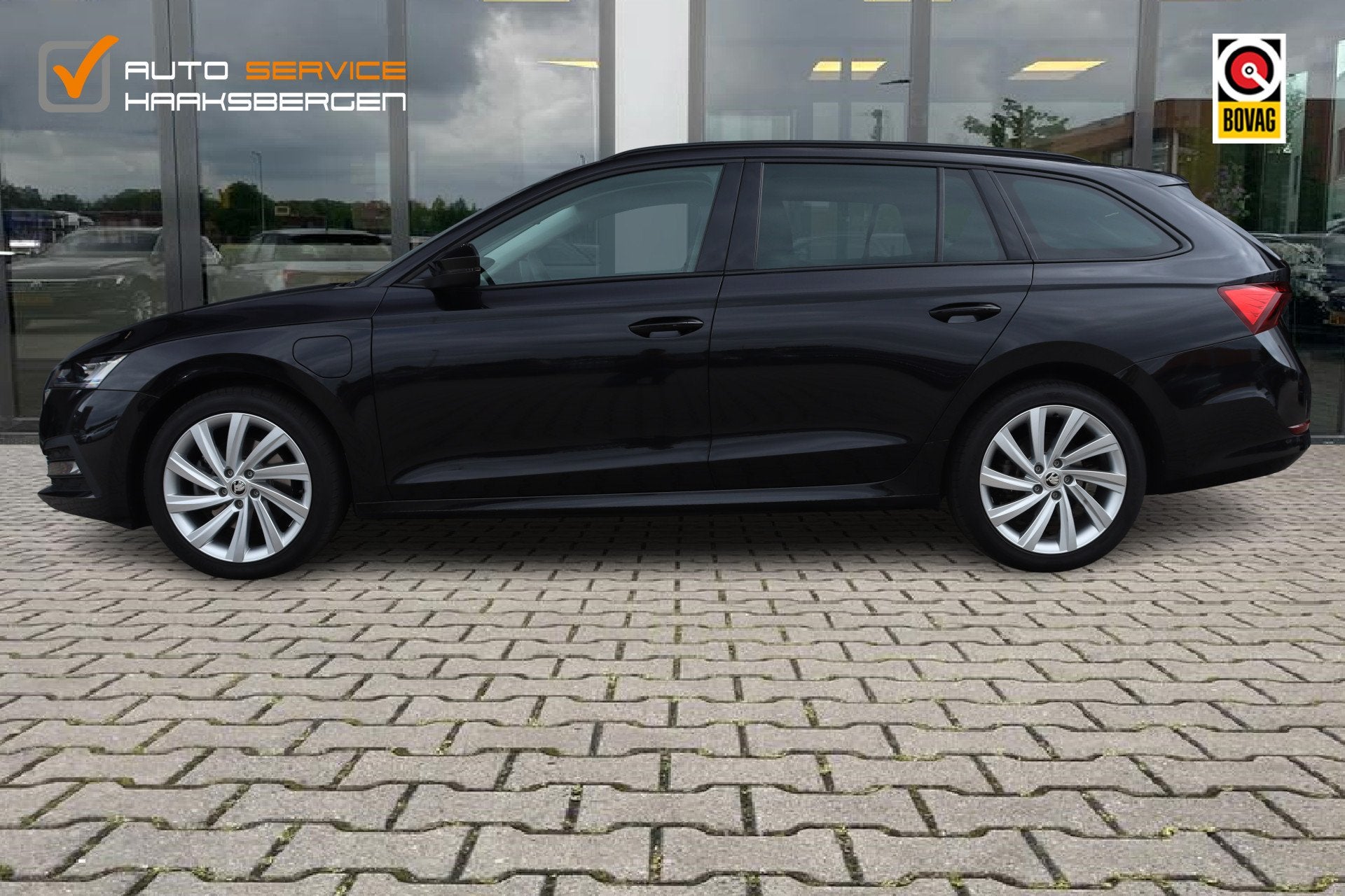 Skoda Octavia Combi 1.4 TSI iV PHEV Business Edition | ACC |, Gebruikt, Leder en Stof, Zwart, Plug-in hybride
