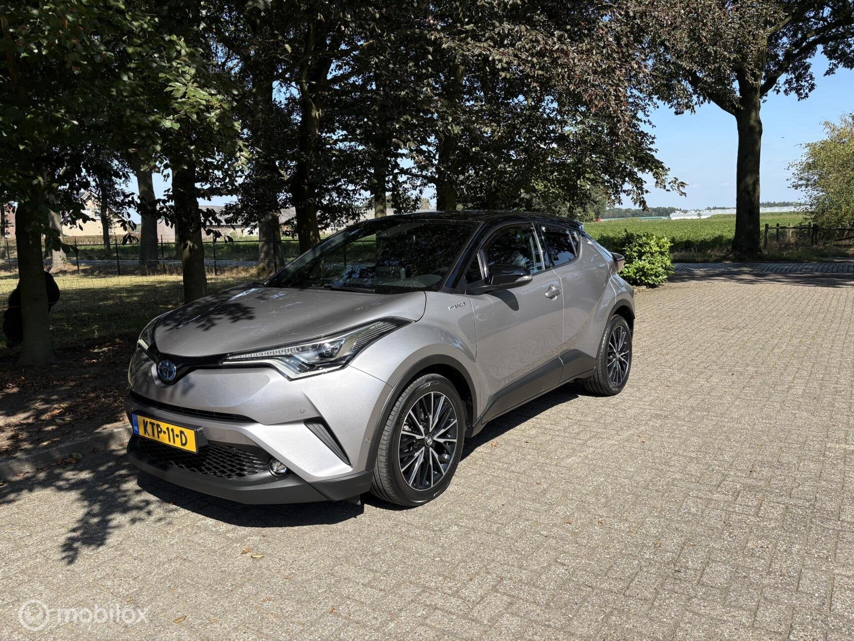 Toyota C-HR 1.8 Hybrid Bi-Tone JBL Keyless all in rijklaar, Dealer onderhouden, Stof, 4 cilinders, 122 pk
