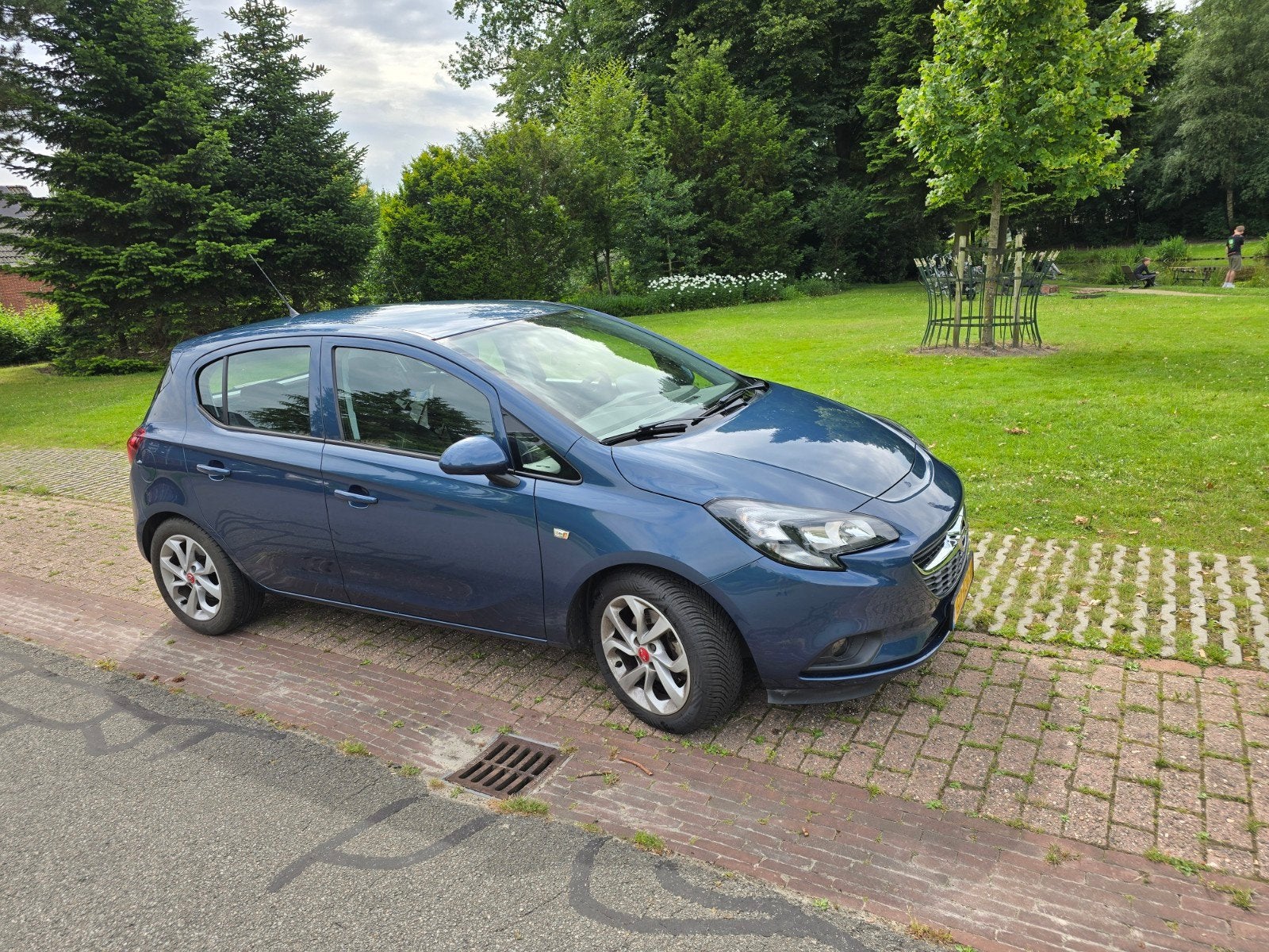 Opel Corsa 1.0T 66KW/90PK 5D 2015 Blauw, Voorwielaandrijving, Elektrische buitenspiegels, Blauw, Origineel Nederlands