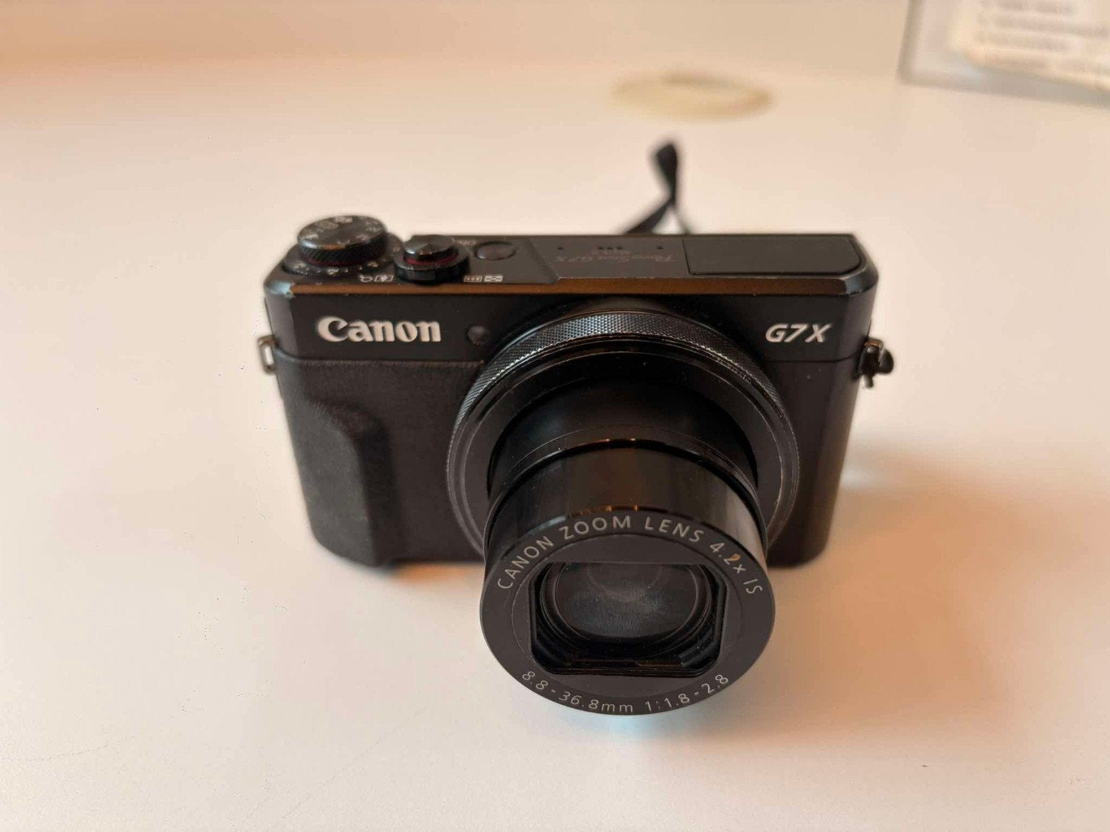 Canon g7x mark ii + 128 gb + opbergcase +

lader
