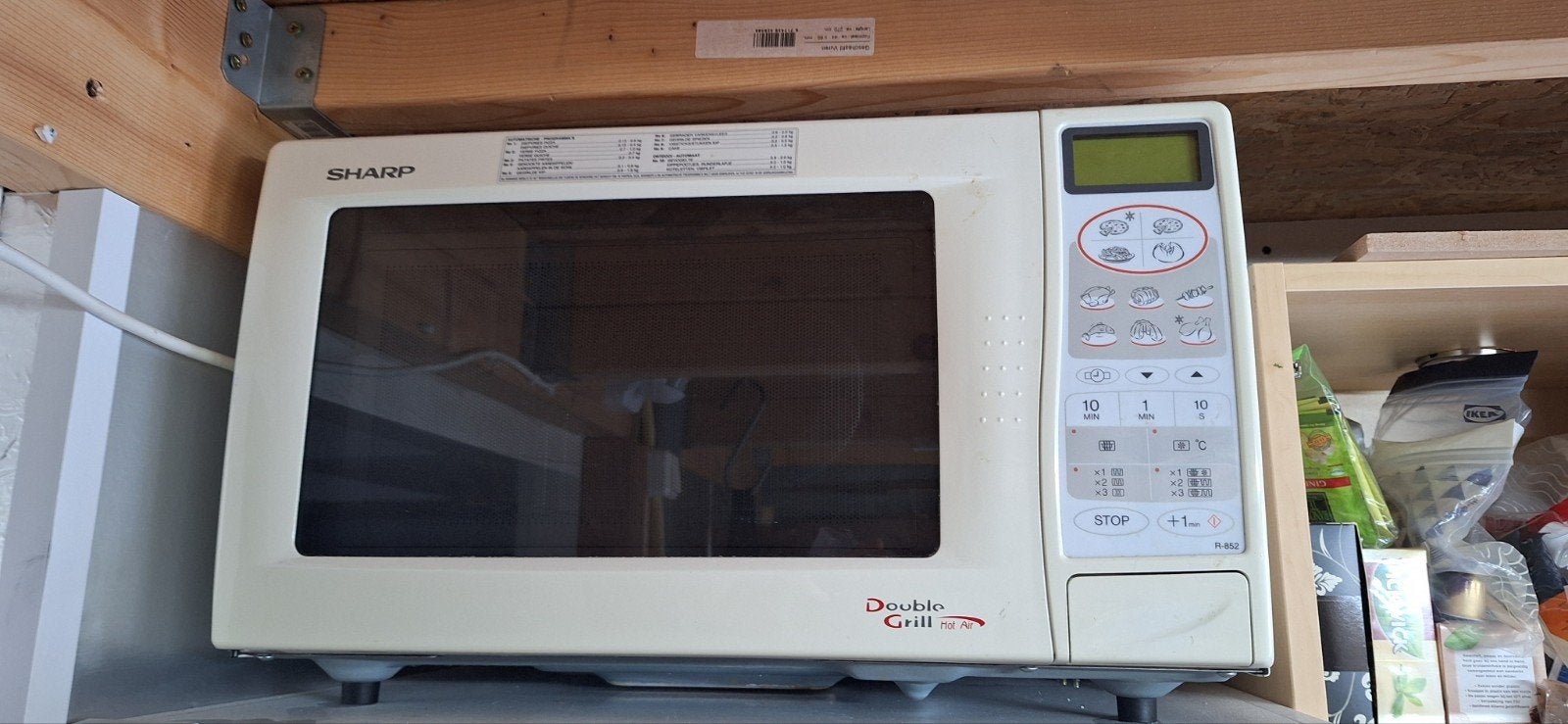 Sharp R-852 Combimagnetron - 900W, Ophalen
