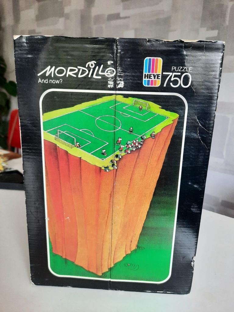 Mordillo puzzel 'And Now?', Hobby en Vrije tijd, Denksport en Puzzels, Ophalen of Verzenden, 500 t/m 1500 stukjes, Gebruikt, Legpuzzel
