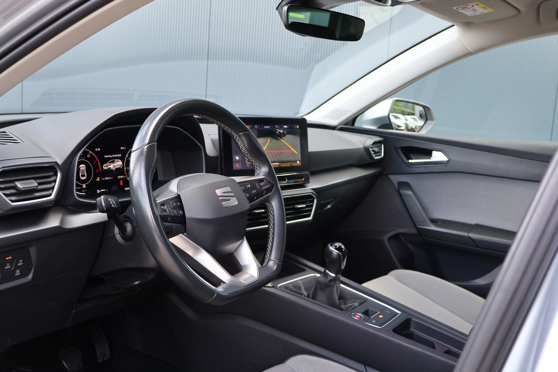 SEAT Leon Sportstourer 1.0 TSI Style Business Intense | Wegk, Auto's, Stof, Gebruikt, Met garantie (alle), Leon