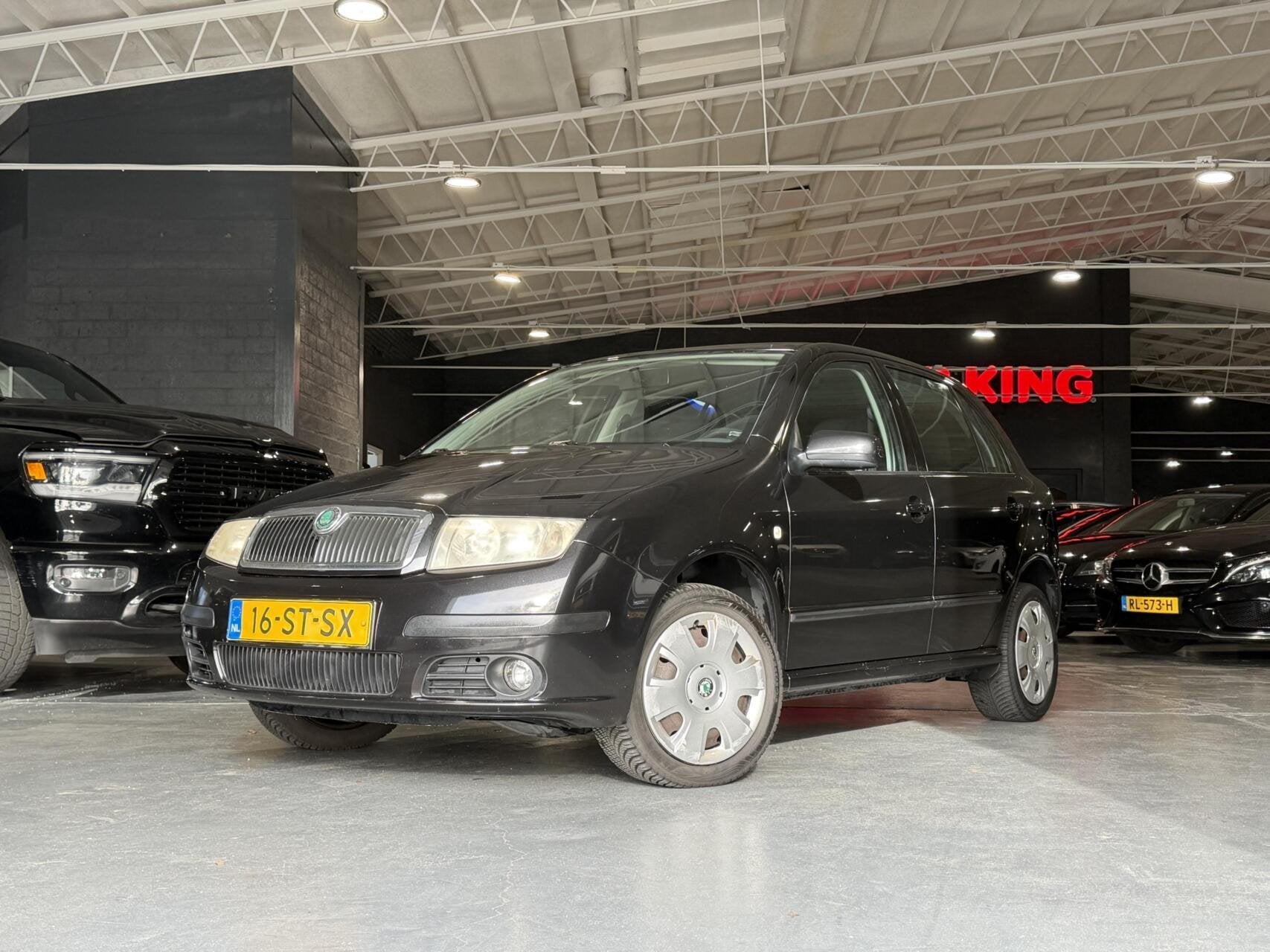 Skoda Fabia 1.4-16V Spirit+ Airco Cruise Trekhaak, Auto's, Voorwielaandrijving, 4 cilinders, Zwart, Origineel Nederlands