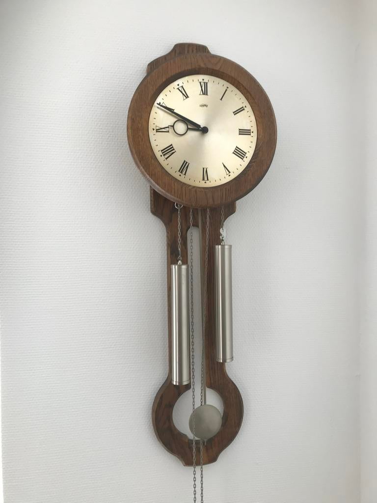 Wandklok E50 kleur Eiken in goede staat, Antiek en Kunst, Ophalen of Verzenden