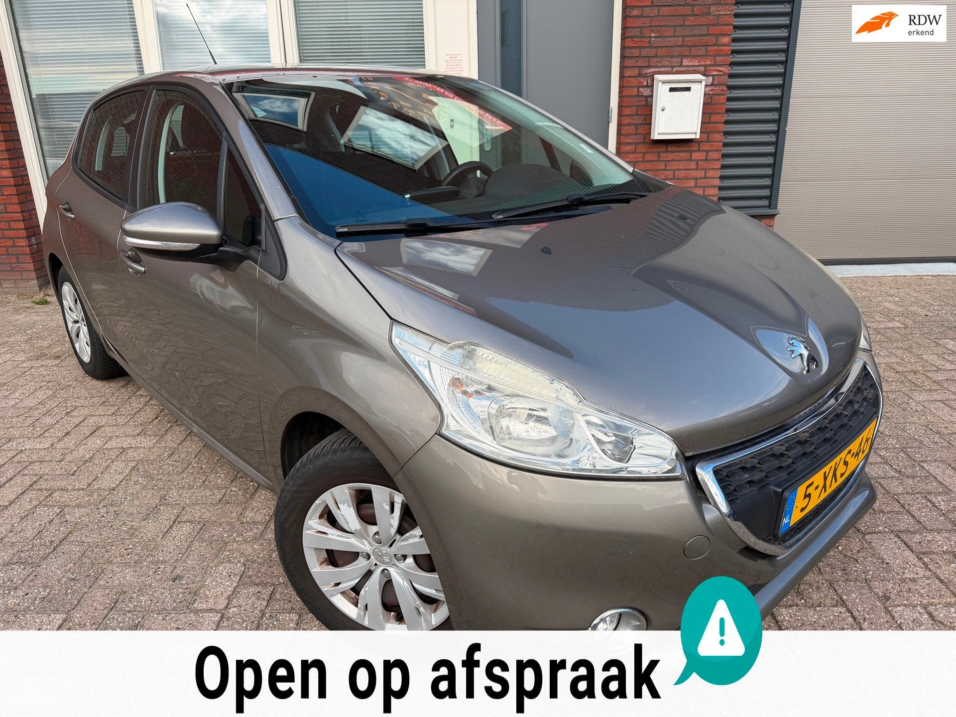Peugeot 208 1.2 VTi Envy / Navi / PDC / Riem v.v / NAP / Cli, Auto's, Peugeot, Voorwielaandrijving, Euro 5, Stof, Gebruikt