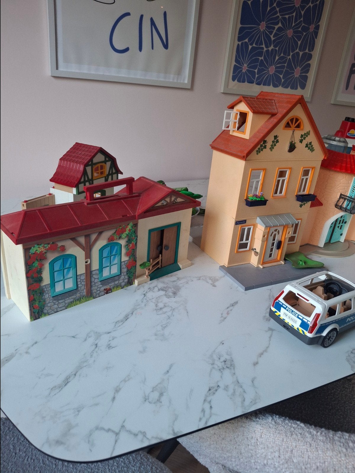 Grote Playmobil collectie met huizen, voertuigen en figuren