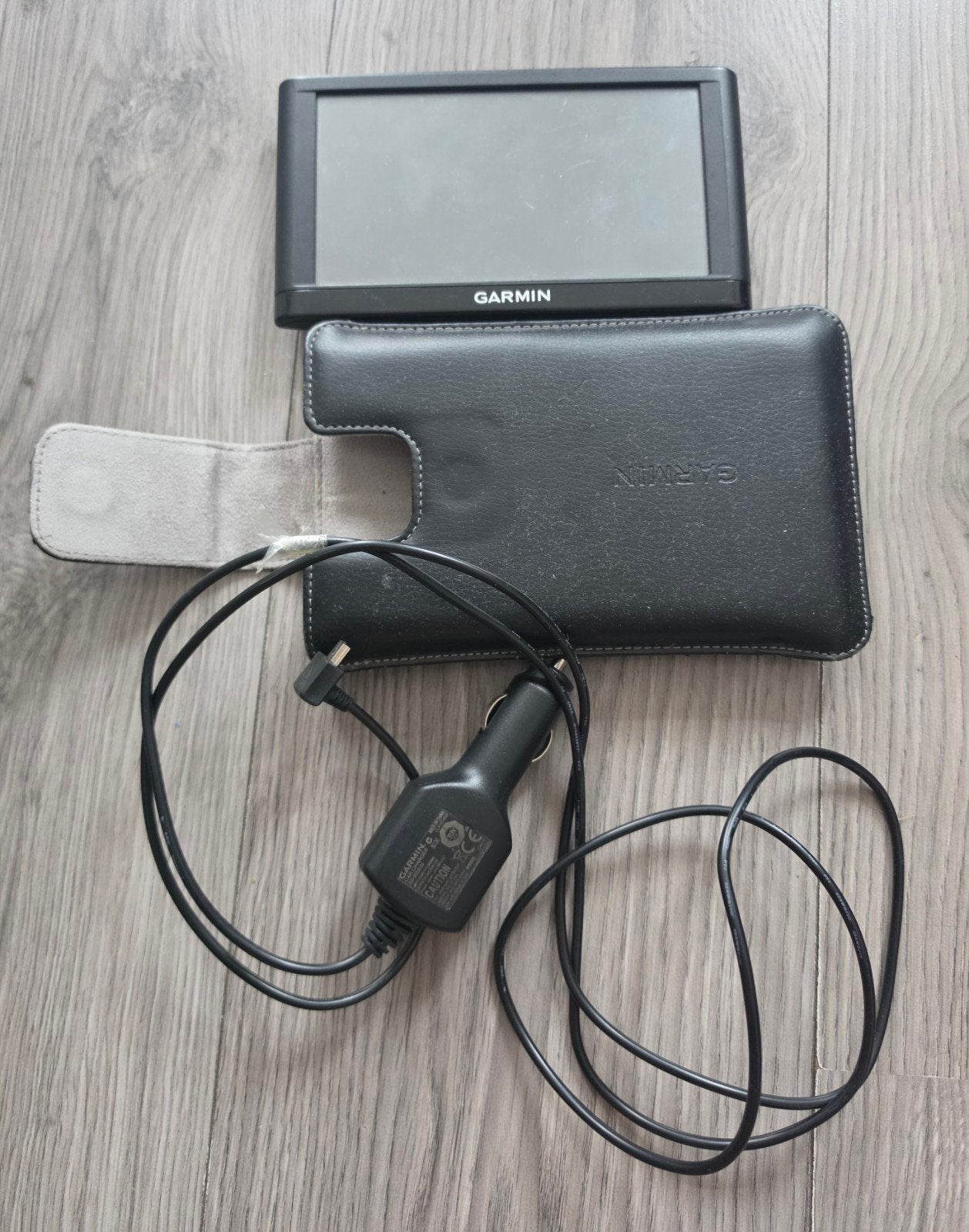 Garmin navigatiesysteem met hoes en autolader, Ophalen of Verzenden, Gebruikt