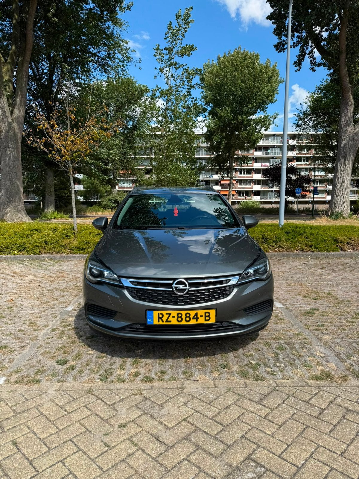 Opel Astra 1.0 Turbo 77KW Sports Tourer 2017 Grijs, Auto's, Voorwielaandrijving, 1178 kg, 620 kg, Stationwagon