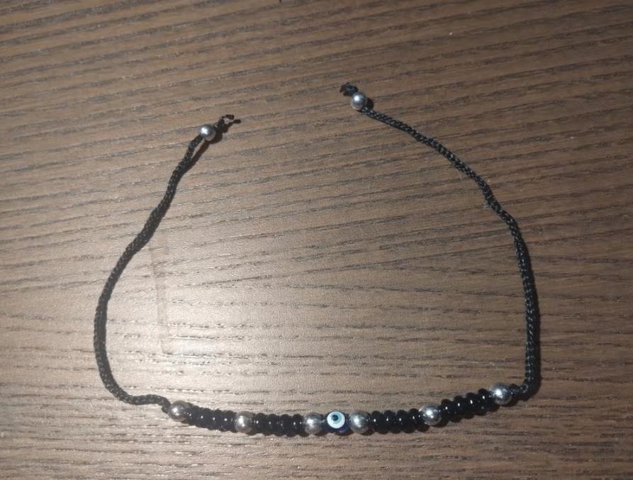Zwart kralen armband met stenen 'evil eye', Overige materialen, Zwart, Ophalen of Verzenden, Zo goed als nieuw