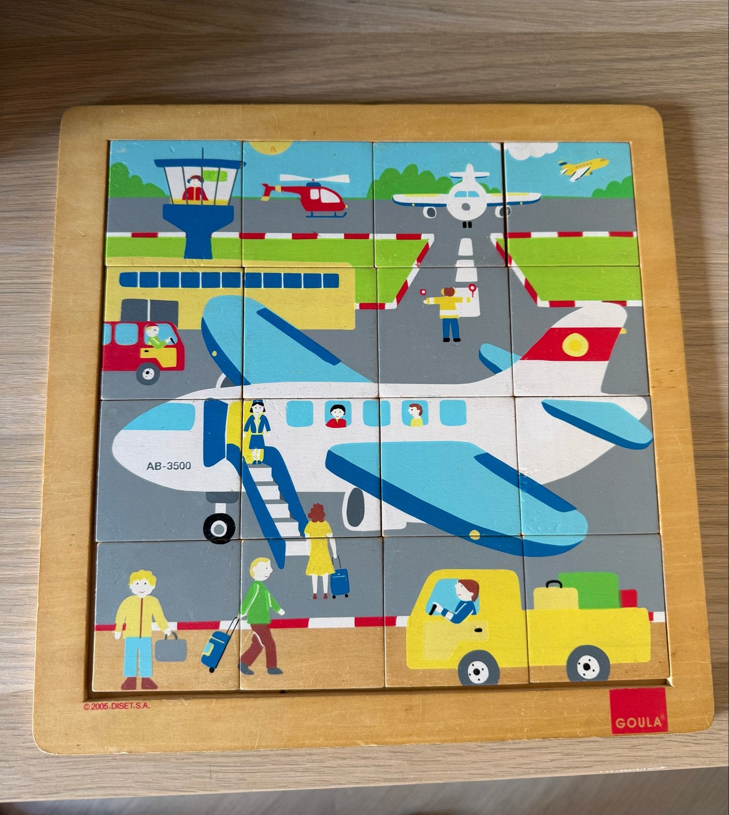 Houten puzzel vliegveld Goula, Kinderen en Baby's, Speelgoed | Kinderpuzzels, 2 tot 4 jaar, Gebruikt, 10 tot 50 stukjes, Ophalen of Verzenden