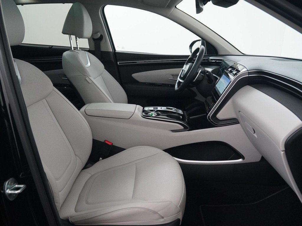 Hyundai Tucson 1.6 T-GDI PHEV Premium Sky 4WD | Panoramadak, Auto's, Hyundai, 14 kWh, Gebruikt, 4 cilinders, Zwart