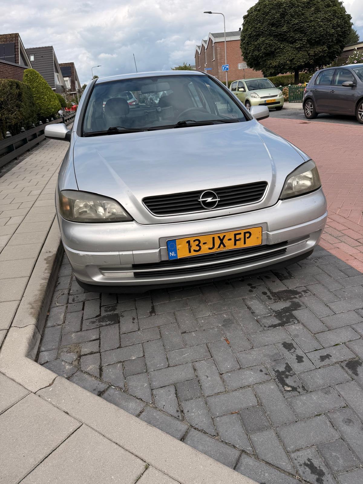 Opel astra grijs /zilver, Ophalen