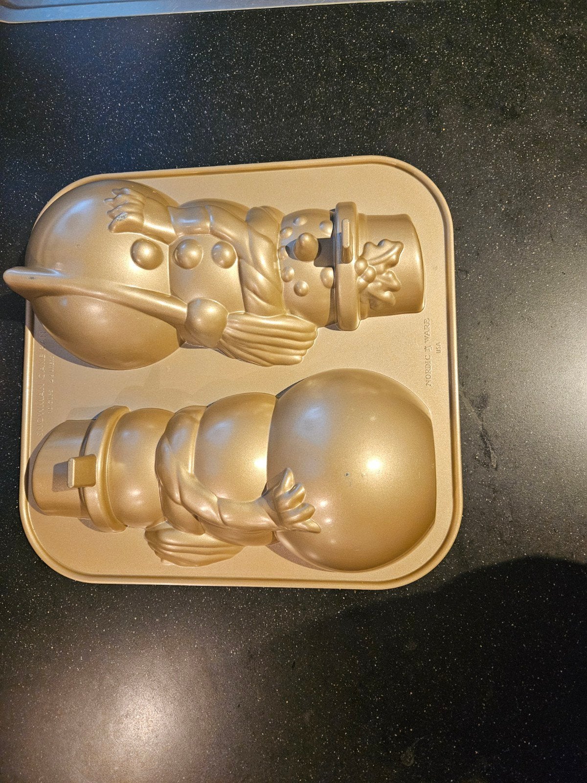 Nordic Ware Sneeuwpop Bakvorm - Perfect voor Feestdagen!, Ophalen of Verzenden, Zo goed als nieuw, Taarten, Bakvorm
