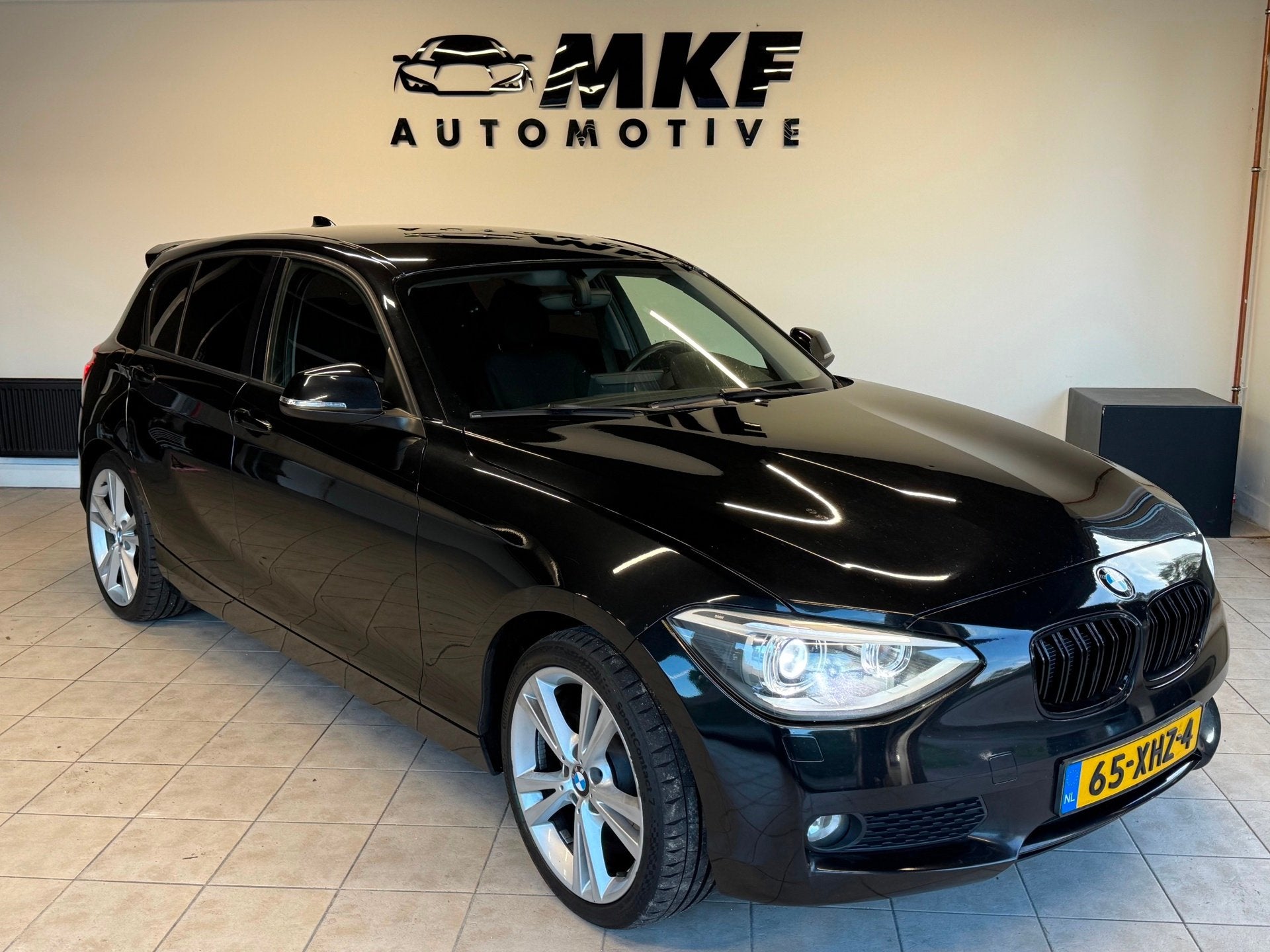 Foto 3 van BMW 1-serie 116D Business 2012 Zwart AIRCO|NAVI|XENON|NAP!