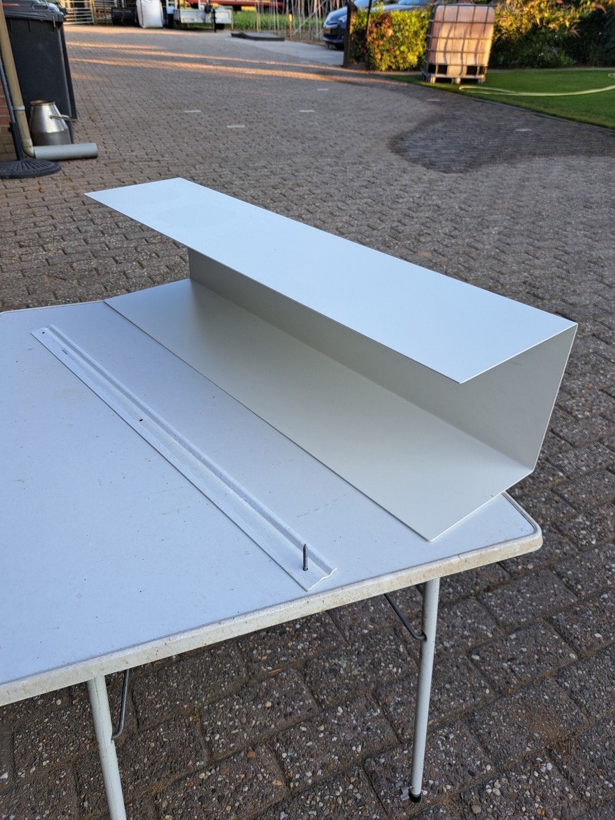 Wandplank dubbel ijzer Ikea, Ophalen