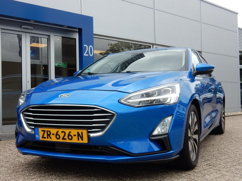 Ford Focus 125PK EcoBoost Titanium Business | Winter Pack |, Auto's, Ford, Stof, Gebruikt, Automatische klimaatregeling, Blauw