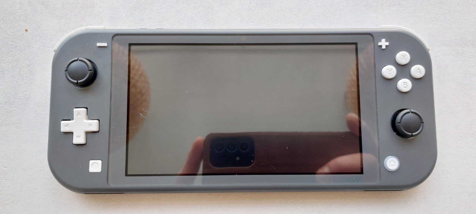 Nintendo switch lite grijs., Spelcomputers en Games, Ophalen, Grijs, Zo goed als nieuw