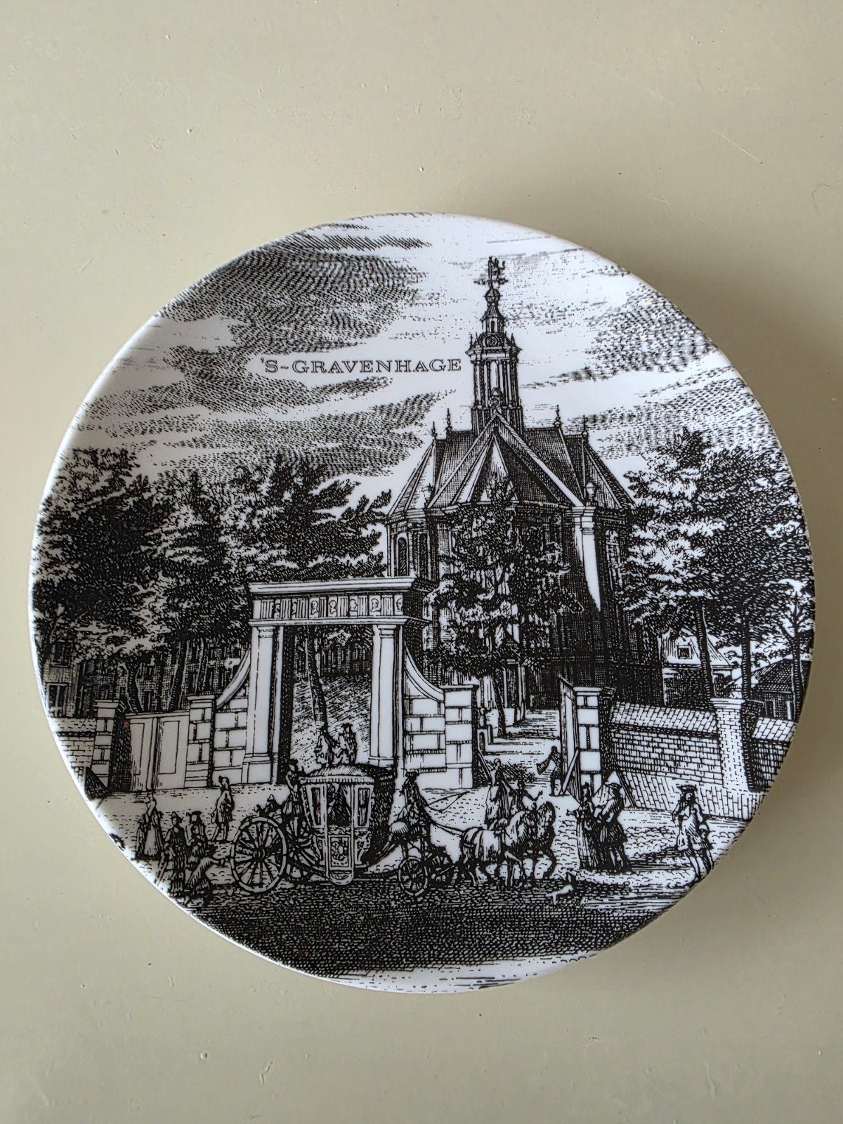 Rocke & Meltzer wandbord Nieuwe Kerk Den Haag Ø19cm, Ophalen of Verzenden