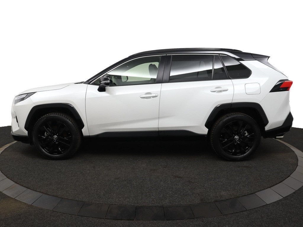 Toyota RAV4 2.5 Hybrid AWD Bi-Tone | Stoel- en Stuurwielverw, Auto's, Toyota, Automaat, 12 maanden, Gebruikt, 4 cilinders
