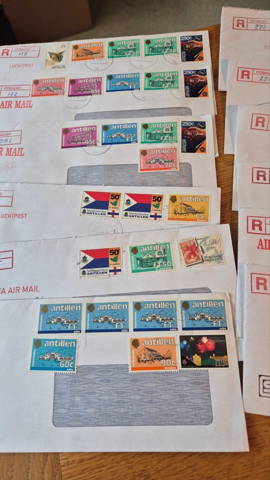 Envelop Curaçao, Ophalen