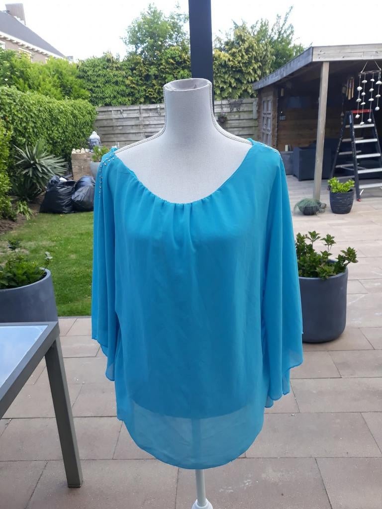 Blouse blauw maat m met vleermuis mouwen met ondertop., Ophalen of Verzenden, Zo goed als nieuw, Maat 38/40 (M), Blauw