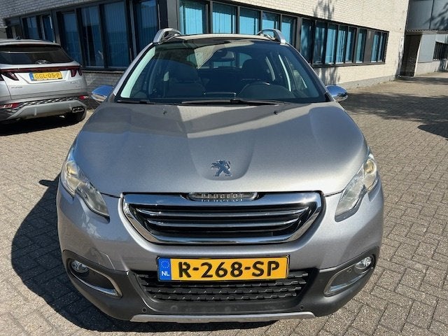 Peugeot 2008 1.2 PureTech Allure PANO CLIMA NAVI CRUISE, Auto's, Euro 5, 1199 cc, 82 pk, Leder en Stof