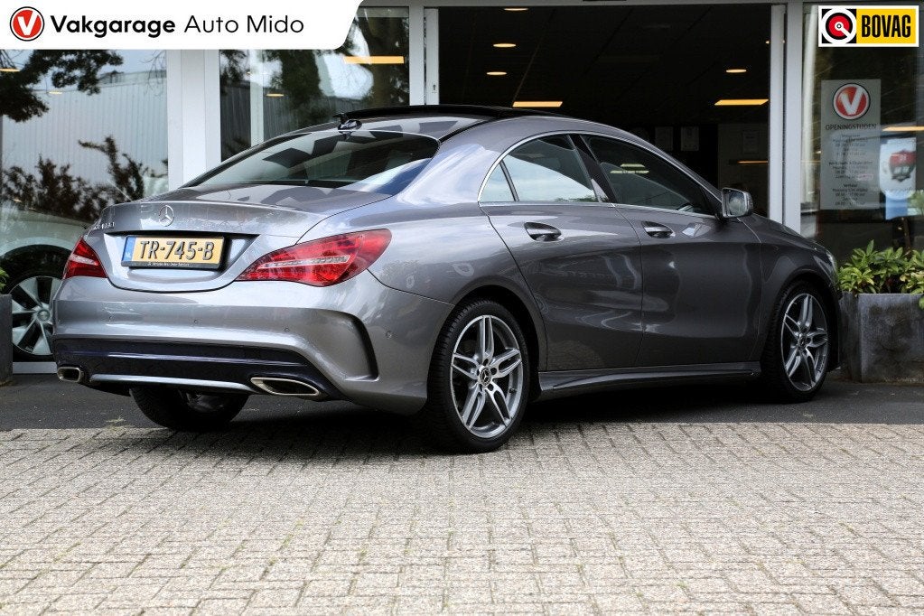 Mercedes-Benz CLA-Klasse 180 Bus. Sol. AMG | Panorama | NL a, Auto's, Gebruikt, 4 cilinders, Lichtsensor, Leder en Stof
