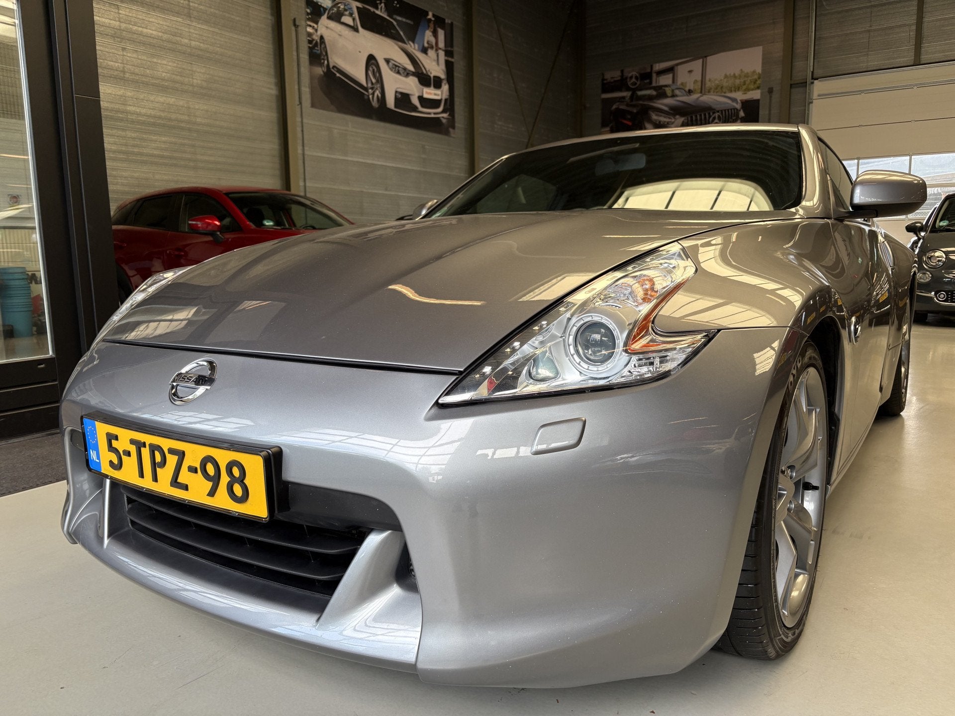 Nissan 370Z 3.7 V6 Pack Bose, Cruise, Navi (bj 2012), Auto's, Automaat, Achterwielaandrijving, Gebruikt, Zwart