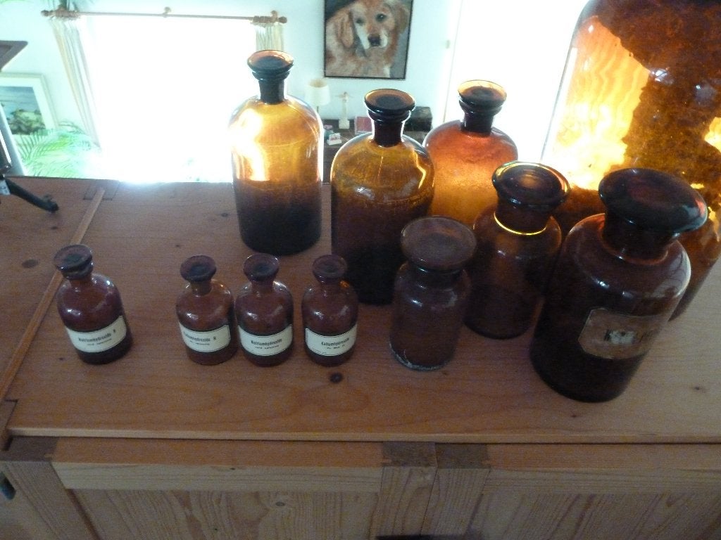 Antieke apothekersflessen set, Ophalen