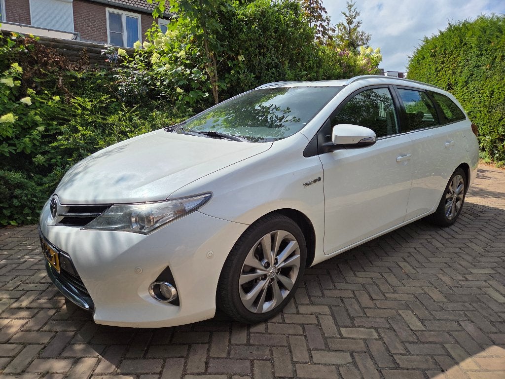 Toyota Auris 1.8 Hybrid Touring Sports CVT 2014 Wit, Auto's, Toyota, Euro 5, Stof, Zwart, 25 km/l