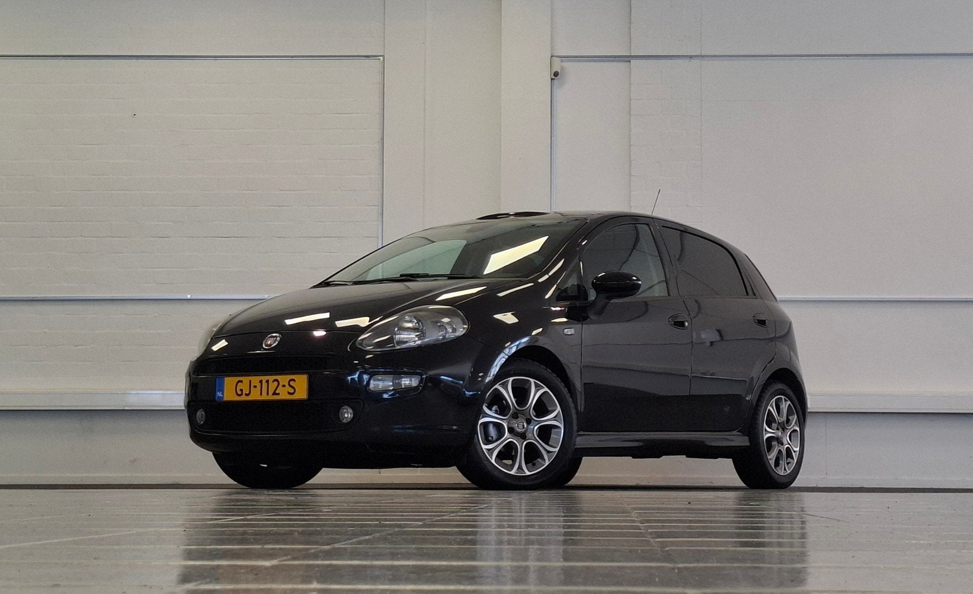 Fiat Punto Evo 0.9 TwinAir Lounge Panoramadak Clima Garantie, Auto's, Fiat, Voorwielaandrijving, Gebruikt, Origineel Nederlands