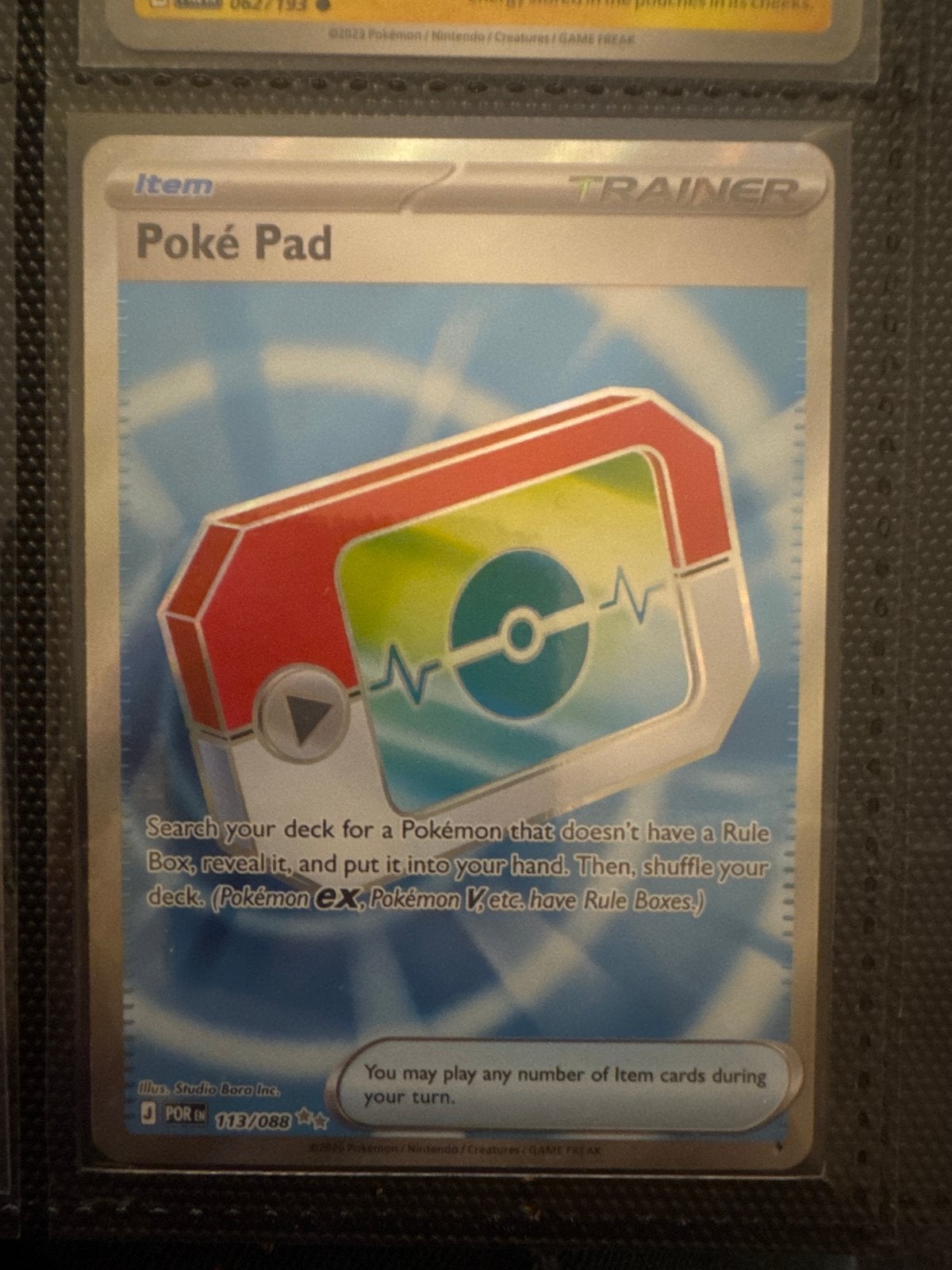 Pokémon TCG: Poké Pad Trainer Kaart (113/088), Ophalen of Verzenden, Zo goed als nieuw, Losse kaart