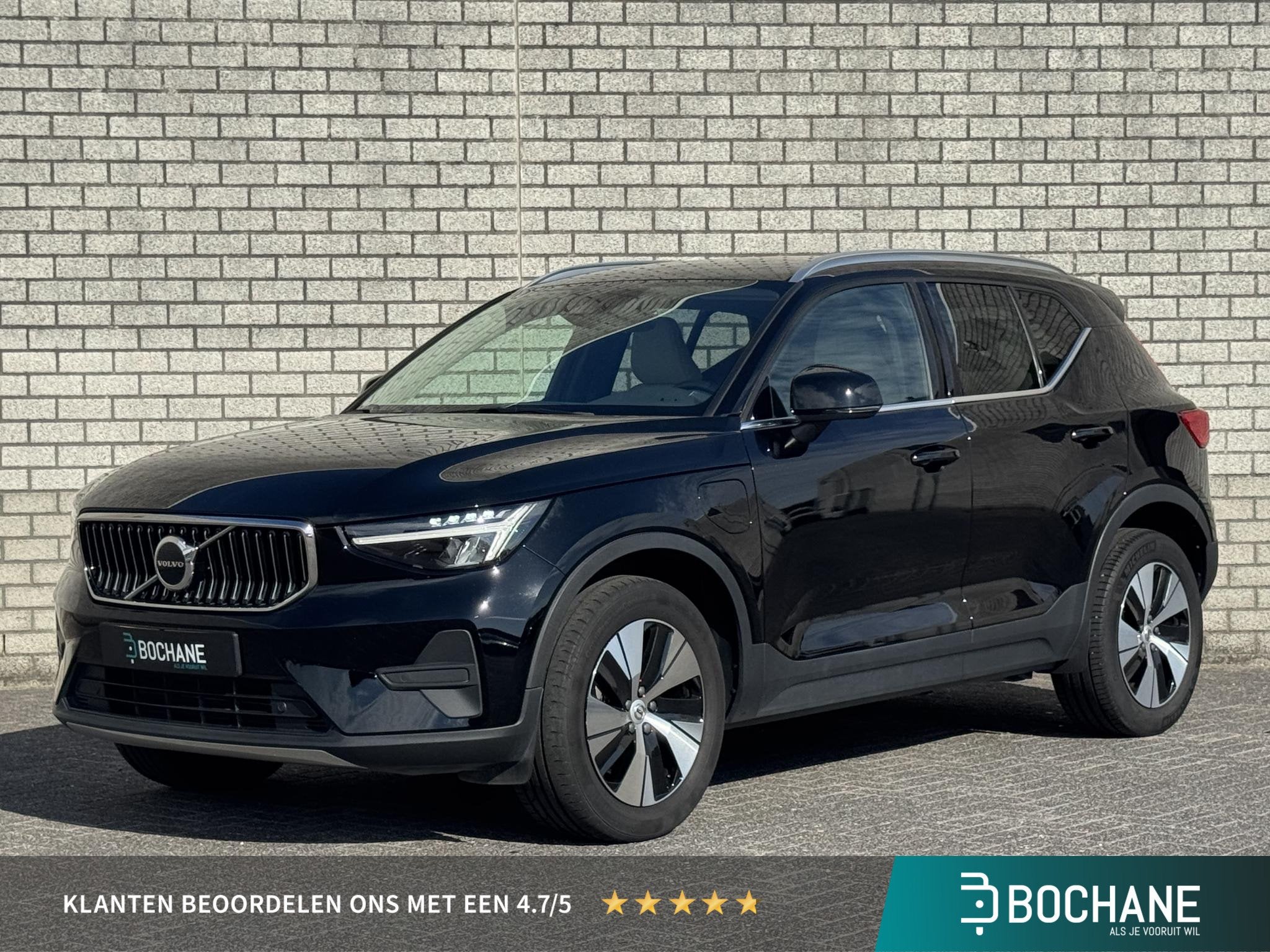 Volvo XC40 1.5 T4 Plug-in hybrid Core Bright | Leder | Navig, Auto's, Met garantie (alle), Zwart, Hybride Elektrisch/Benzine, 3 cilinders