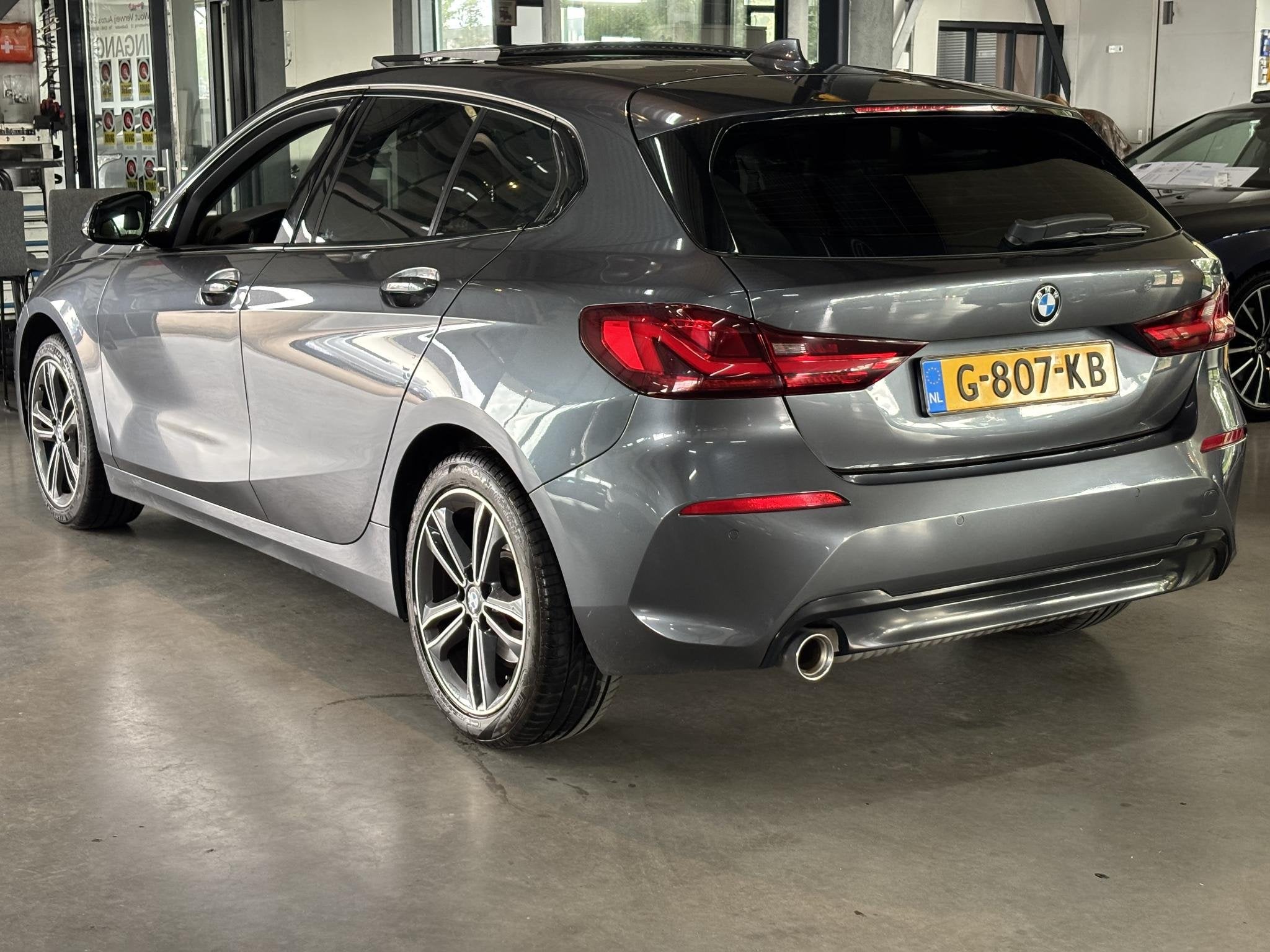 BMW 1-serie 118i Executive Sport Edition, Auto's, Gebruikt, Leder en Stof, Origineel Nederlands, 3 cilinders