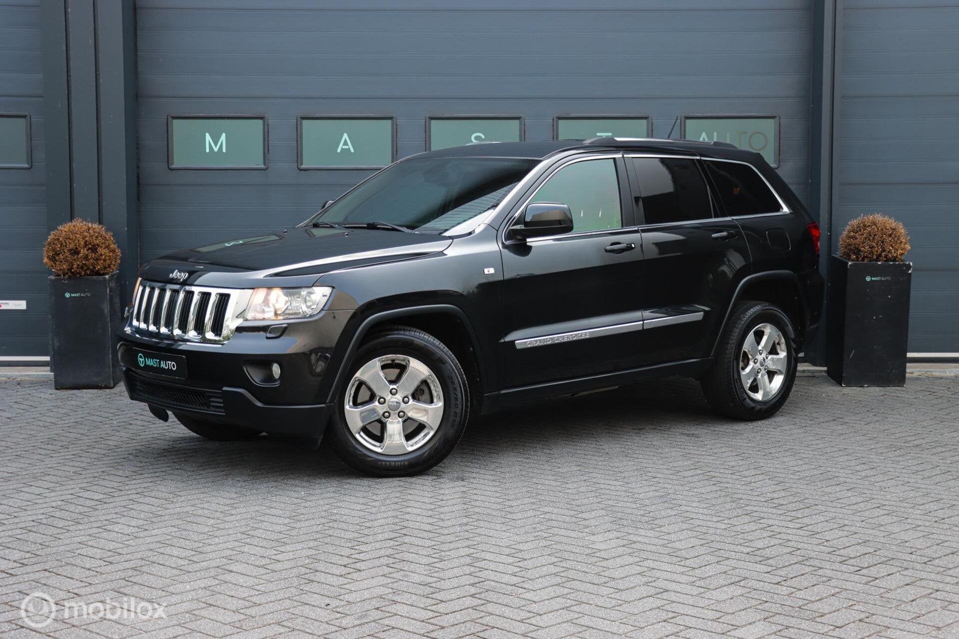 Jeep Grand Cherokee 3.0 CRD Laredo | NAP | Leder | Trekhaak, Auto's, Euro 5, Stof, Gebruikt, Zwart