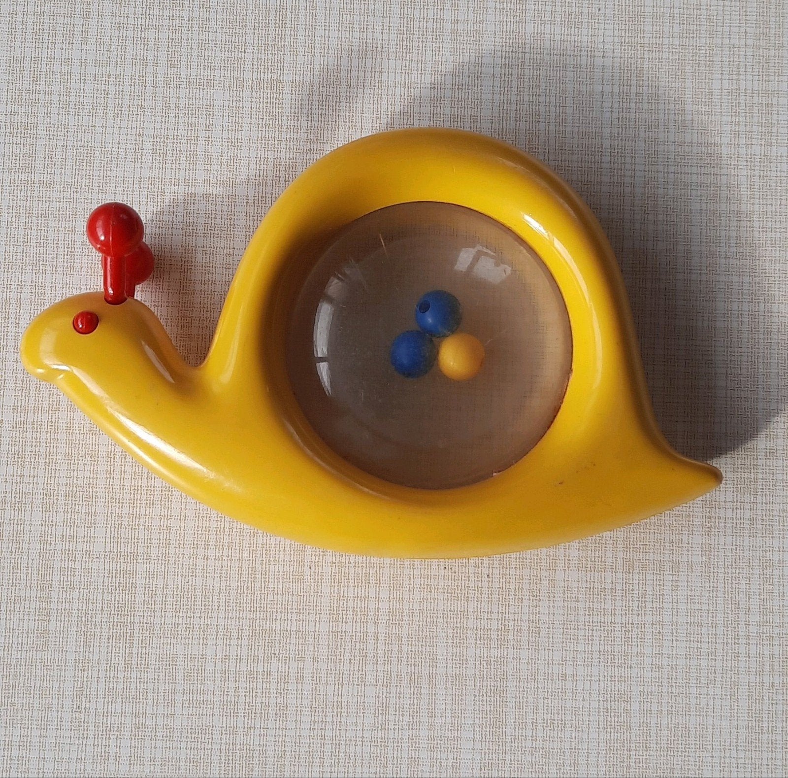 Rammelaar slak Ambi Toys babyspeelgoed, Ophalen of Verzenden
