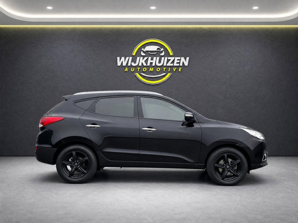 Hyundai Ix35 2.0i Style Automaat met Climate ! Camera ! 17 I, Auto's, Gebruikt, Zwart, 4 cilinders, Leder en Stof