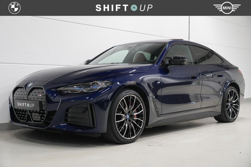 BMW i4 M50 84 kWh Harman Kardon | Schuifdak | CoPilot, 520 km, Blauw, Leder, 2190 kg