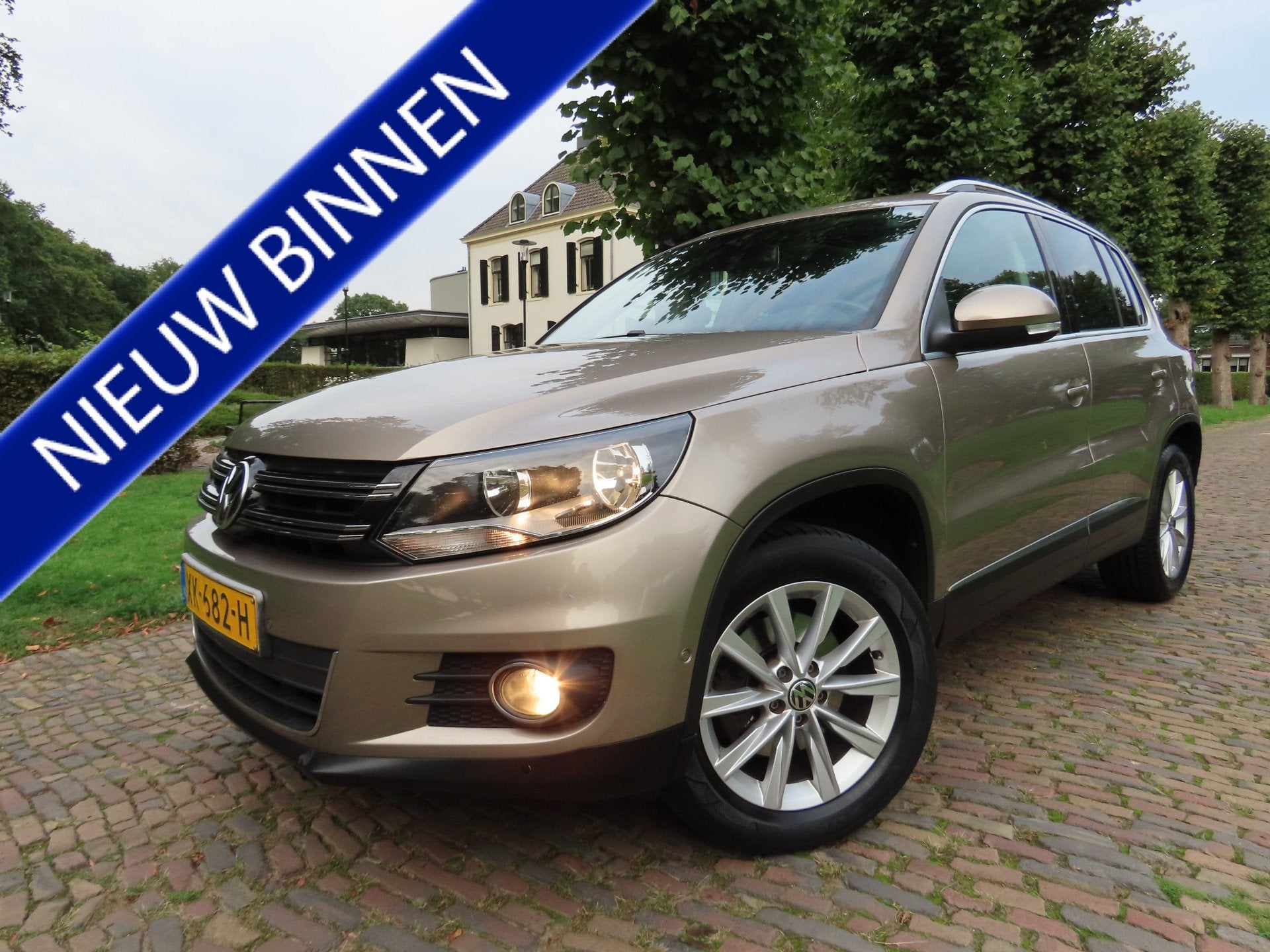 Volkswagen Tiguan 1.4 TSI Track&Field 4Motion Leer Panoramad, Auto's, 13 km/l, Euro 5, Zwart, 4 cilinders