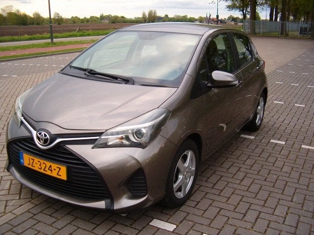 Toyota Yaris 1.0 16V Vvti 5DR 2016 Grijs, Auto's, Toyota, Voorwielaandrijving, 40 €/maand, 730 kg, Origineel Nederlands
