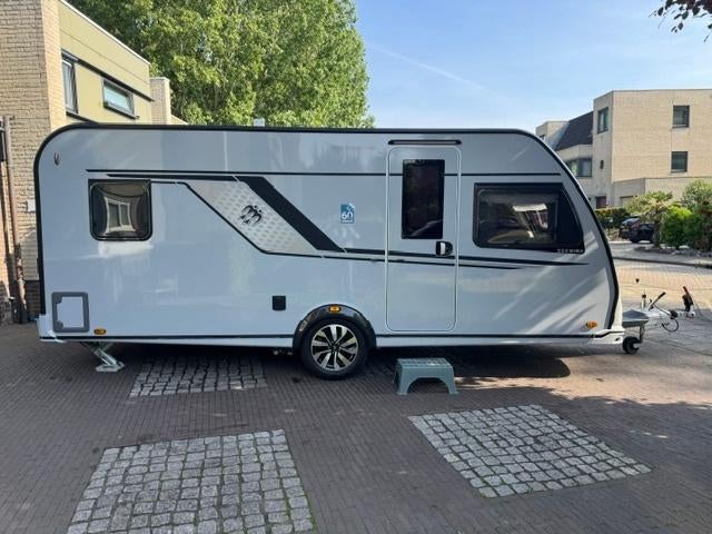 Knaus Südwind 500 UF 60 Years Mover Alde verwarming, Caravans en Kamperen, Vast bed, Rondzit, 7 tot 8 meter, Bedrijf