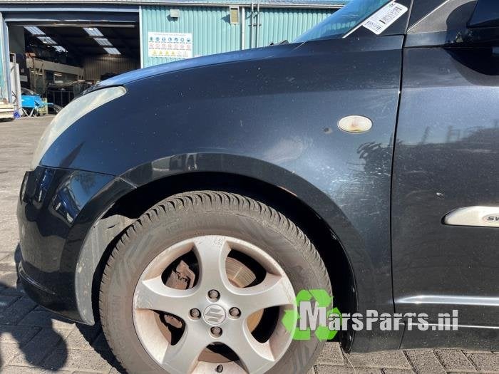 Scherm links-voor van een Suzuki Swift