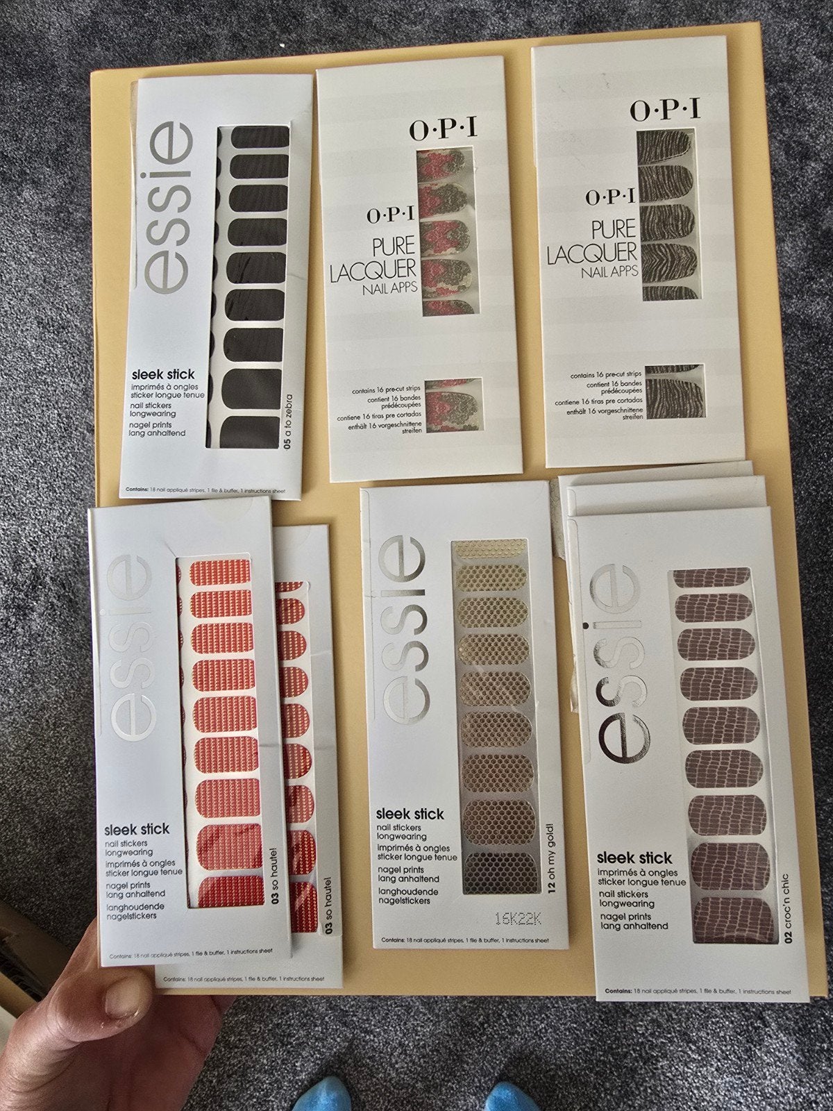 Essie en O.P.I nagelstickers ( 9 pakjes), Sieraden, Tassen en Uiterlijk, Overige kleuren, Nieuw, Ophalen of Verzenden, Handen en Nagels