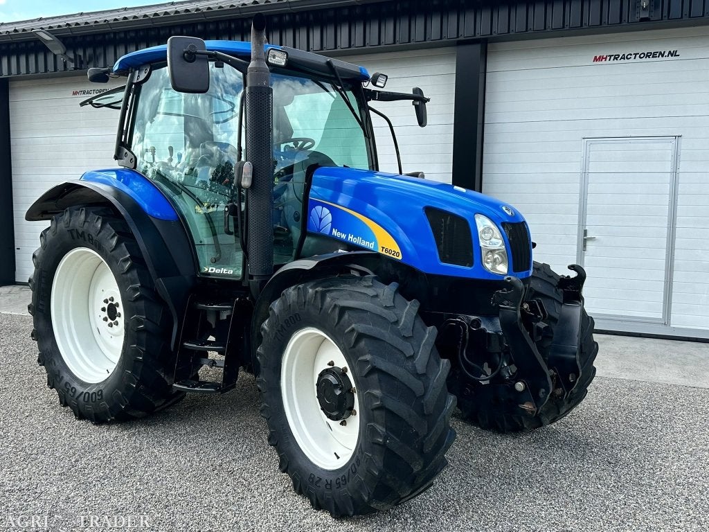 TE KOOP: zeer nette NEW HOLLAND T6020, 80 tot 120 Pk, MH-Tractoren, Info@mhtractoren.nl, 7500 tot 10000
