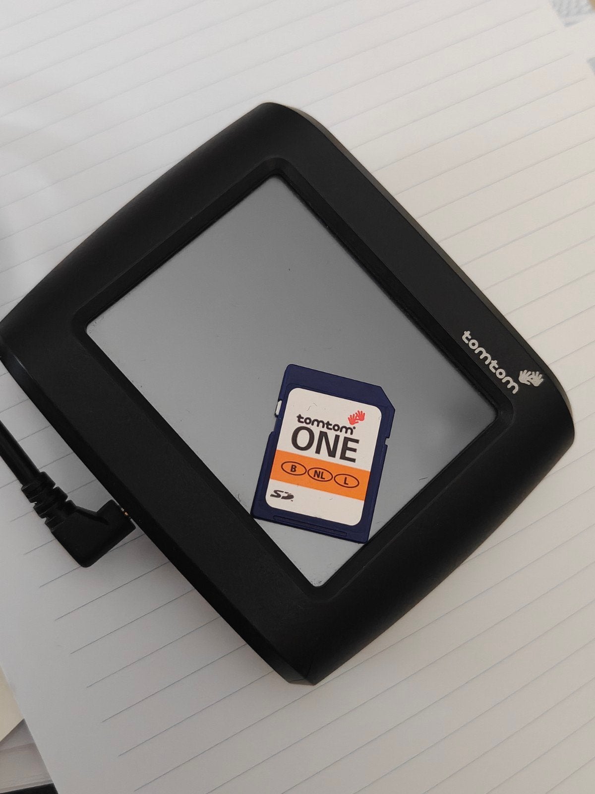 TomTom ONE (4N00.001) GPS navigatiesysteem met lader, Ophalen of Verzenden, Gebruikt