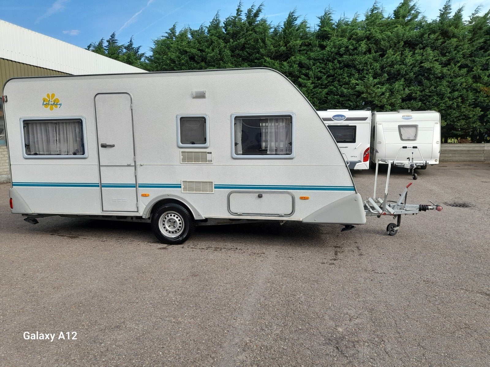 Eifelland Holiday 460 TK (stapelbed)., Caravans en Kamperen, Dwarsbed, Rondzit, 750 - 1000 kg, Tot en met 5