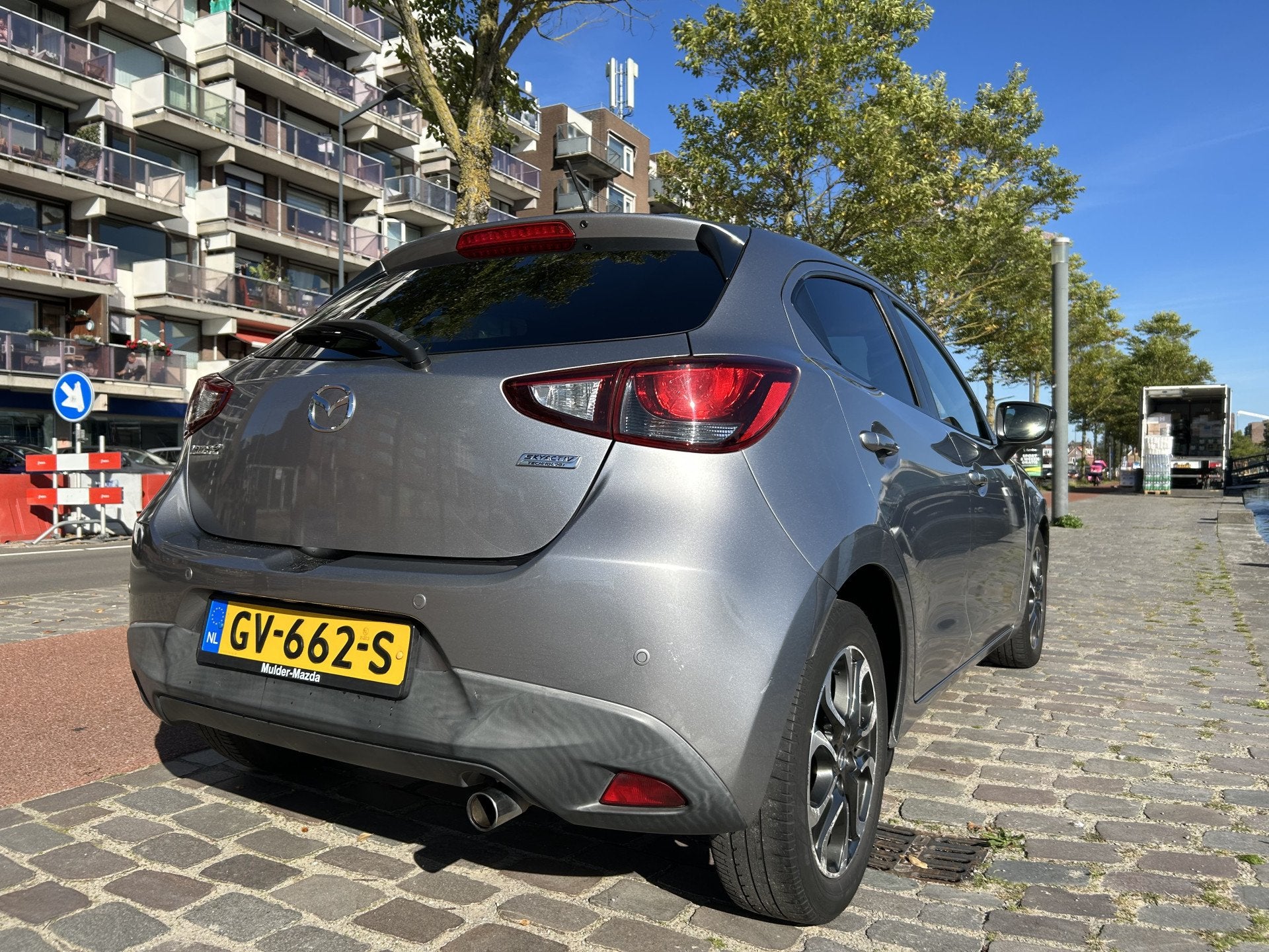 Mazda 2 1.5 Skyactiv-G GT-M navigatie airco/ecc keurige auto, Auto's, Voorwielaandrijving, Dealer onderhouden, Stof, Gebruikt
